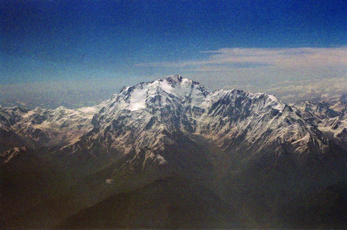 07 Nanga Parbat Diamir Face And Mazeno Ridge Wide View On Flight From Islamabad To Skardu Nanga Parbat (8125m, ninth highest in world) stands alone as the westernmost bastion of the mighty Himalayan Range. Nanga Parbat means Naked Mountain, named for its huge white massif consisting of a 20km long ridge called Mazeno on the south west and Rakhiot in the north east. It is also called Killer Mountain because of the number of people who died attempting the summit. It was finally conquered in a solo ascent without oxygen by Austrian Hermann Buhl in 1953.